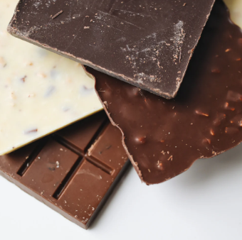 chocolate pieces on a white background